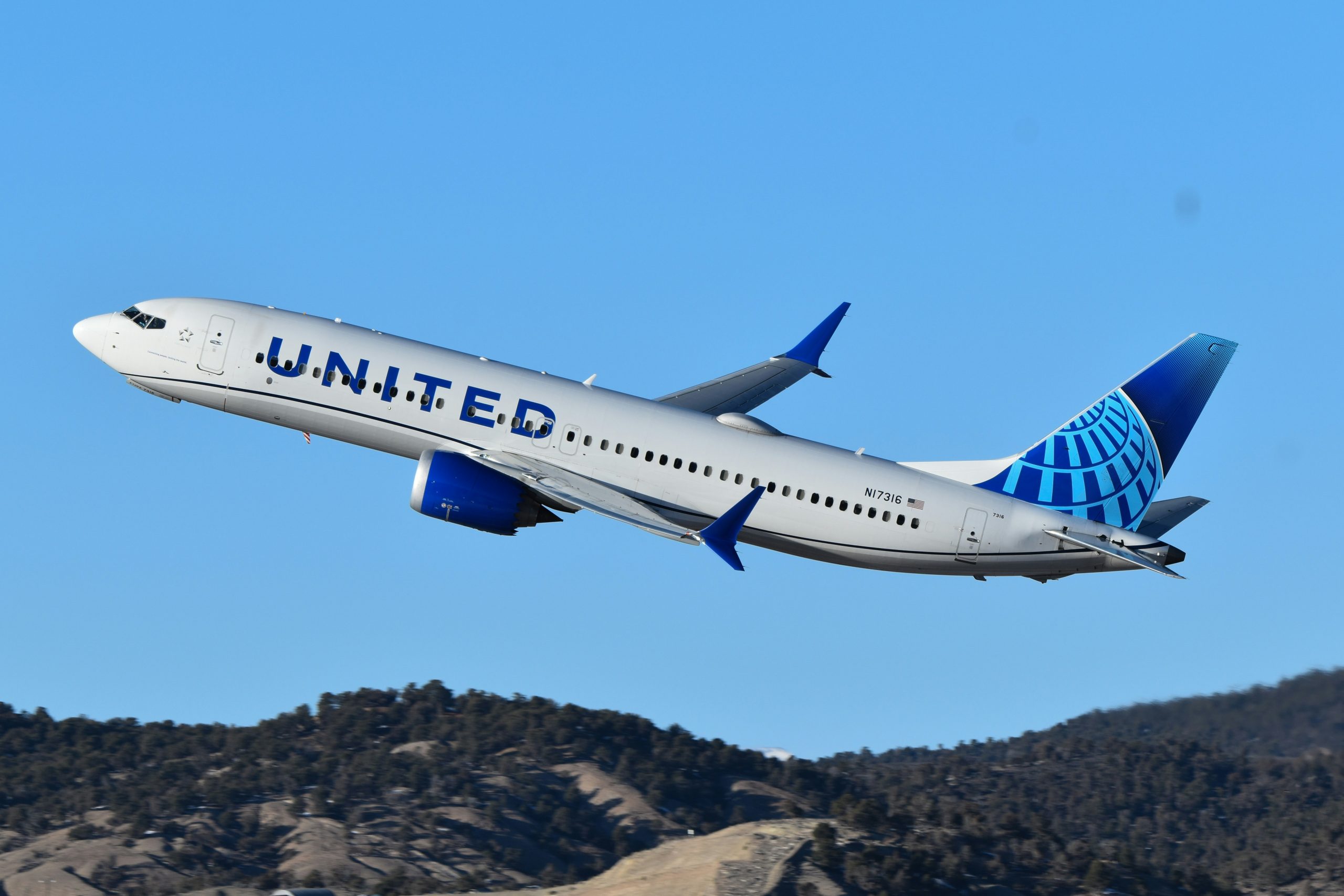 United Airlines flight diverted after passenger seen texting about plane hijacking